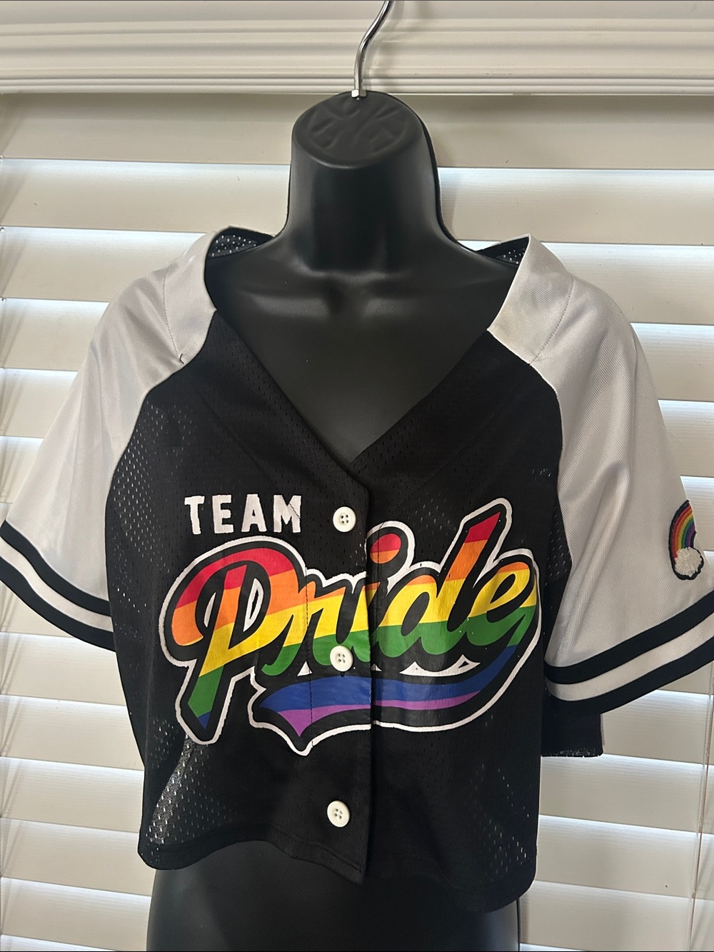 Spencer's Black Mesh Jersey with Orange Logo Accent